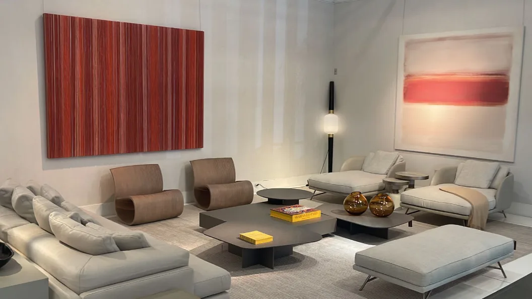 Bold red kinetic string art in luxury showroom setting