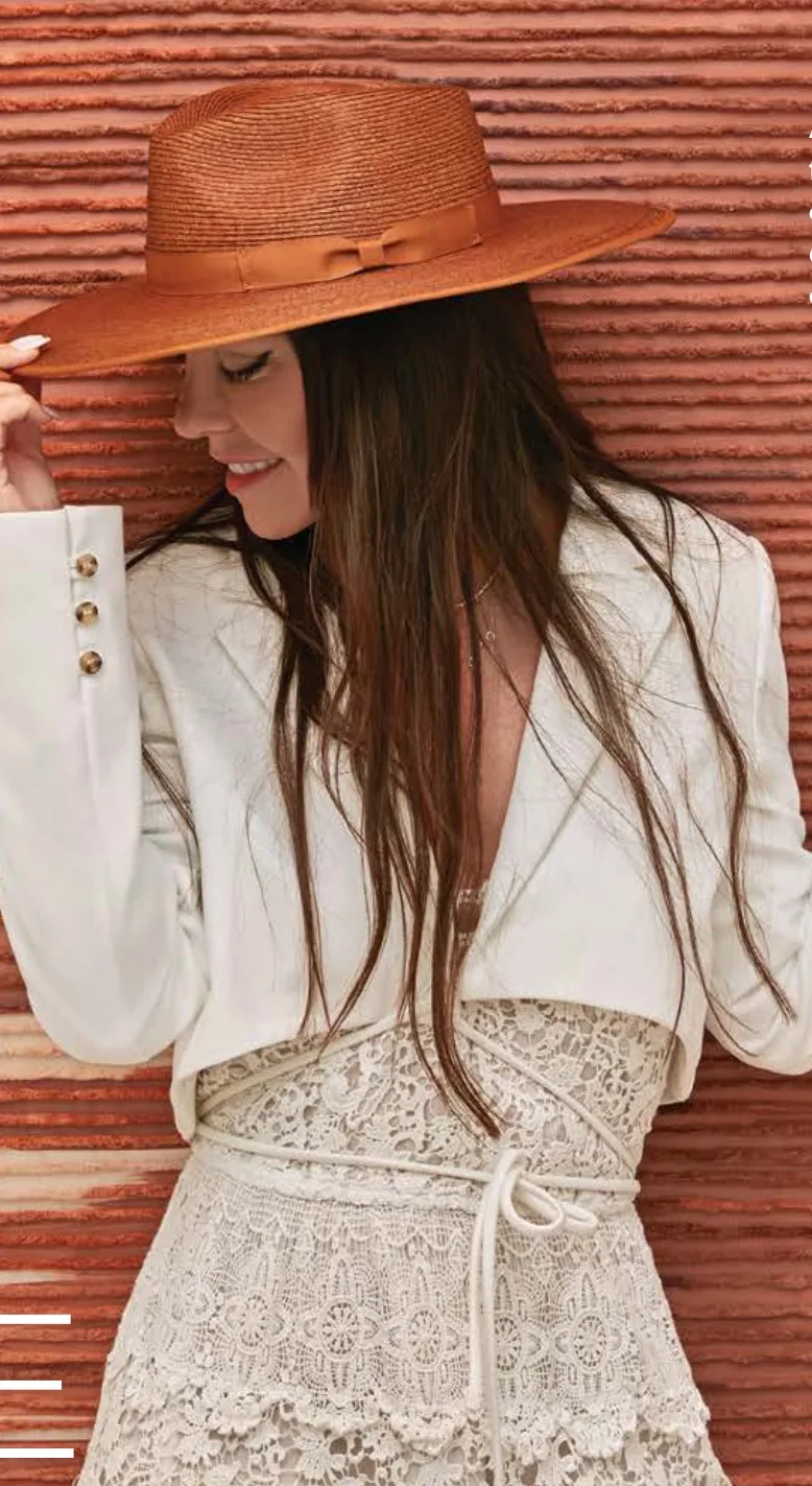 Alessandra Meskita in front of her kinetic string art